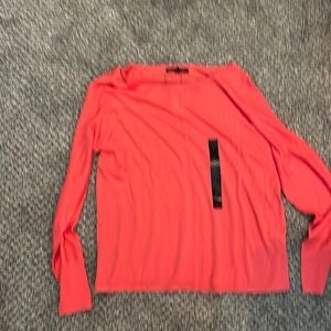 Thin sweater. Coral color